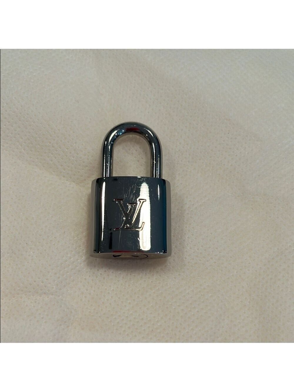 Louis Vuitton Shiny Silver Lock #322